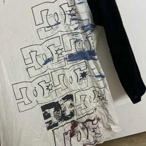 DC Men’s White Tee with Black Sleeves and Multicolor Logo